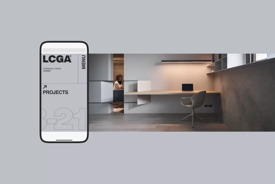 Smartphone displaying LCGA Projects with a modern office desk and chair in the background.